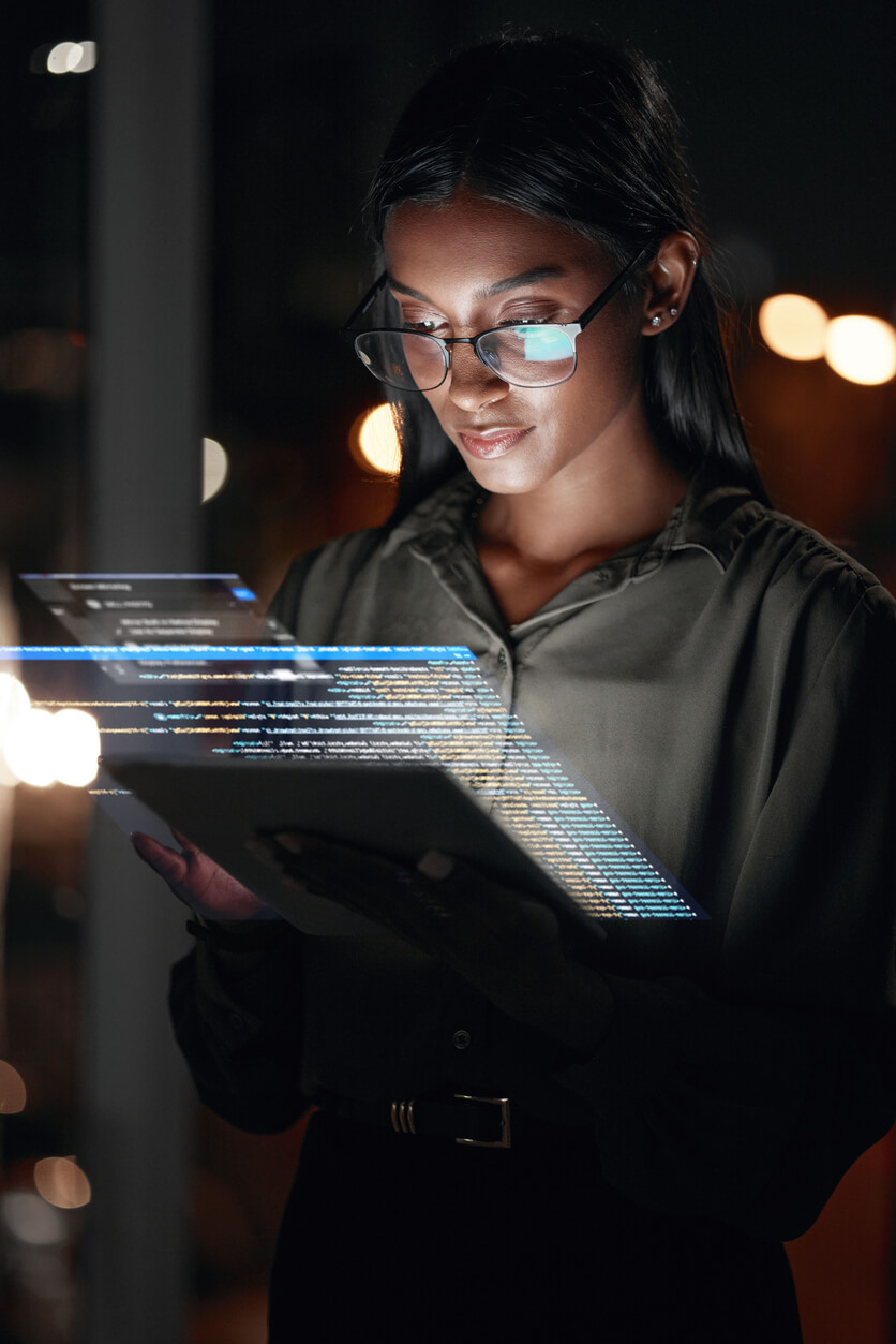 A woman explores MCTV Internet plans on her iPad