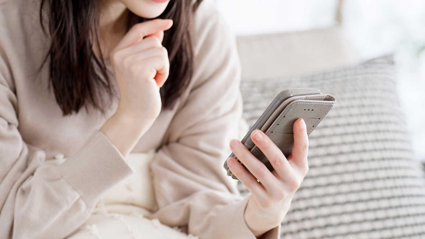 Woman struggling to reply to message